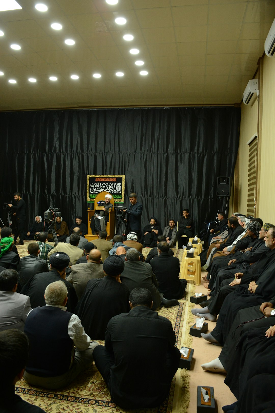 person looking at puzzle pieces on  table