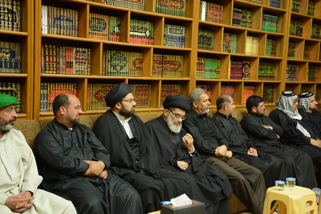 person-holding-pen-thinking-questions